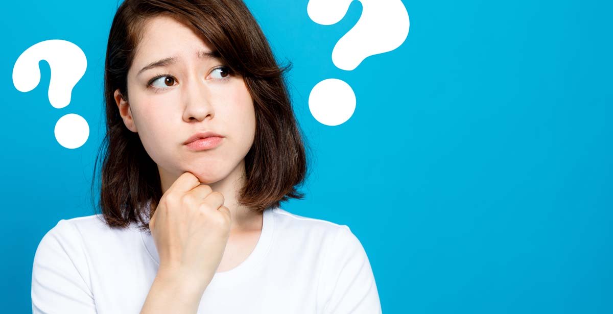女性とクエスチョンマーク