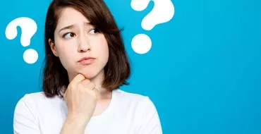 女性とクエスチョンマーク